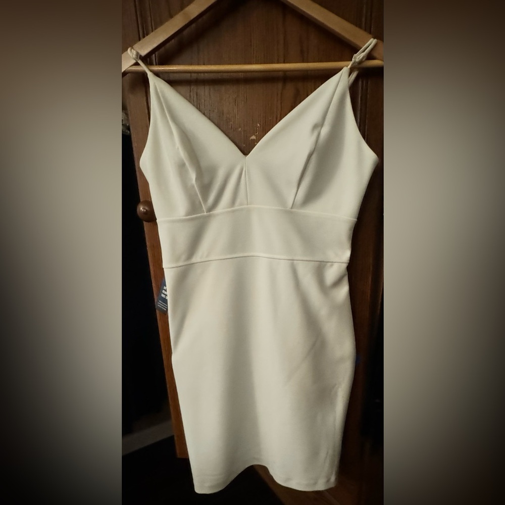 Express women’s white sheath dress in medium.